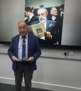 Phillip Leigh read a poignant poem as the community paid tribute to Alan Weinberg