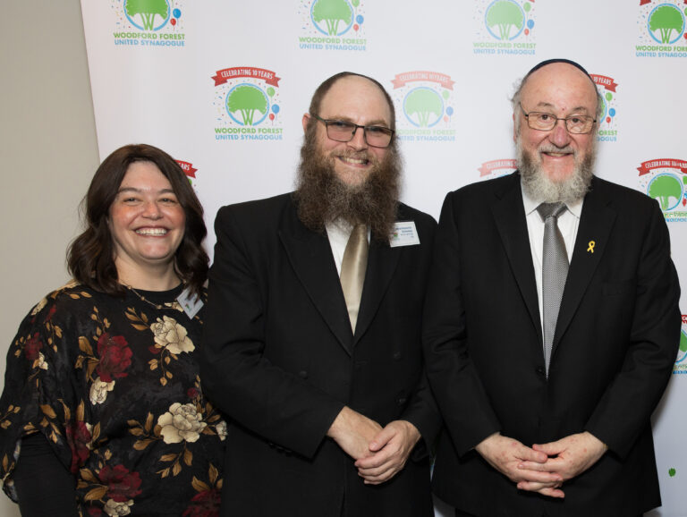 Rebbetzin Blima Wollenberg and Rabbi Mordechai Wollenberg with Chief Rabbi Ephraim Mirvis