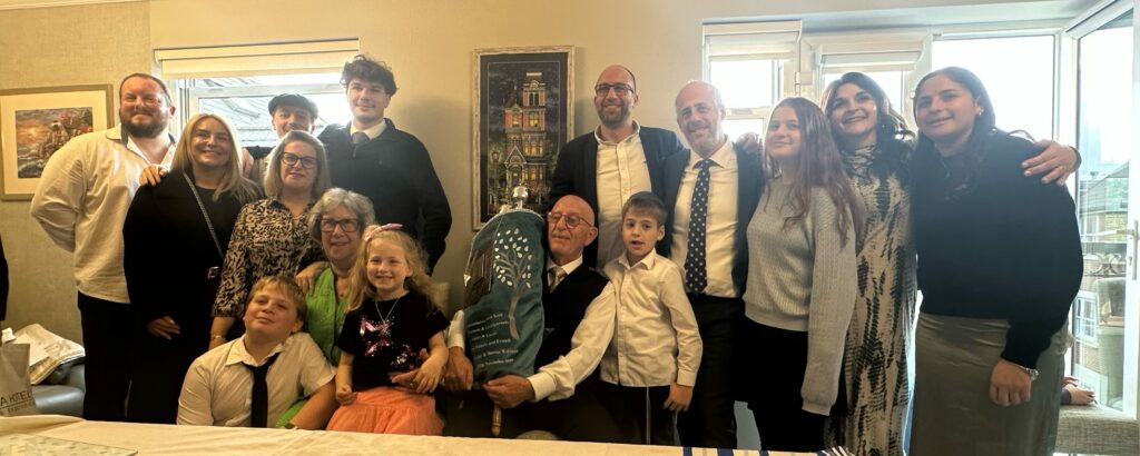 The Wohlman family with the new Sefer Torah