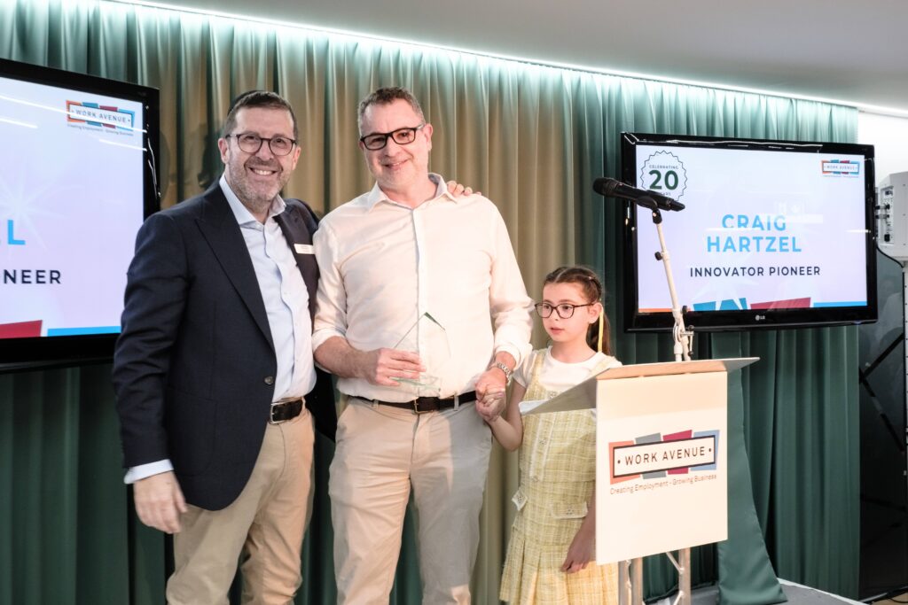 Paul Mann with Award winner Craig Hartzel and Craig's daughter