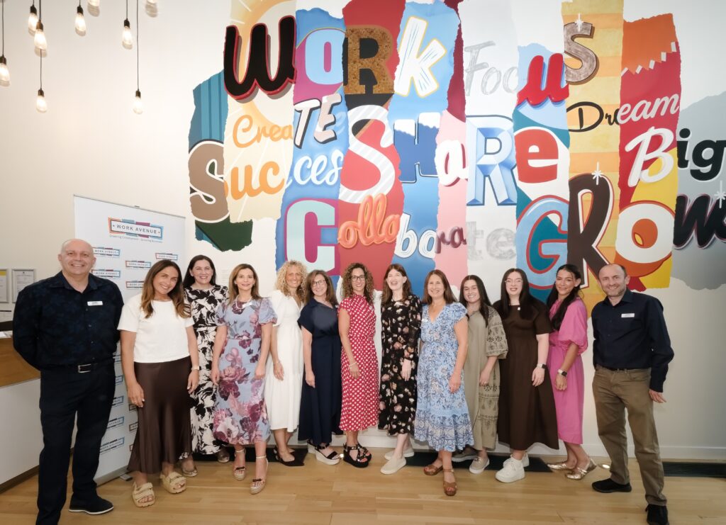 The Work Avenue staff team celebrate the charity's 20th anniversary