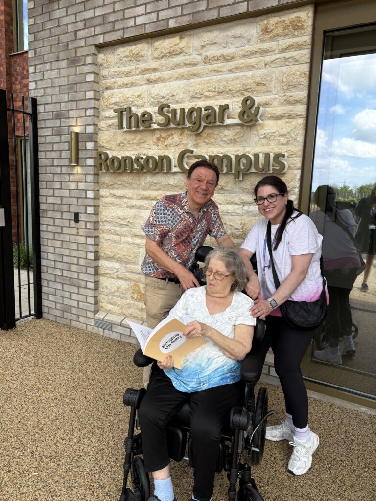 Resident Naomi with her husband Norman and daughter Nicole as she moves into to The Sugar Family Care Home